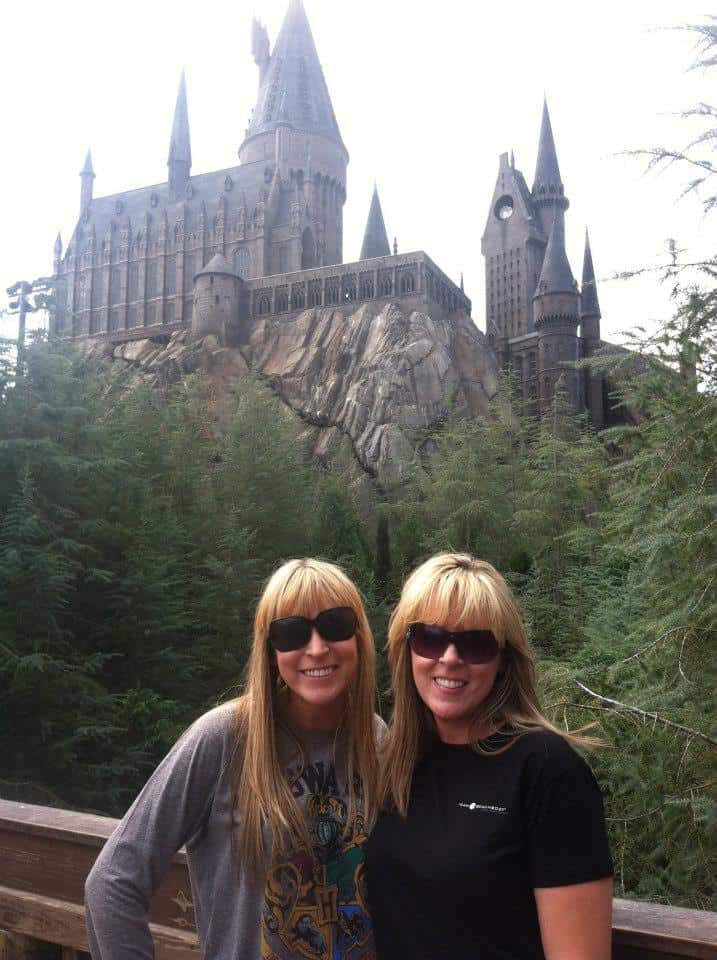 Kim and Kalee in front of Hogwarts at Universal Studios