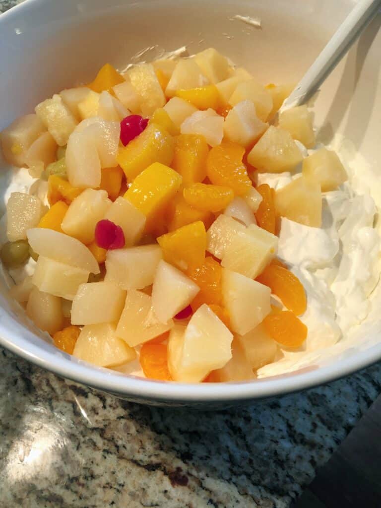 Fruit Cocktail into cream cheese mixture