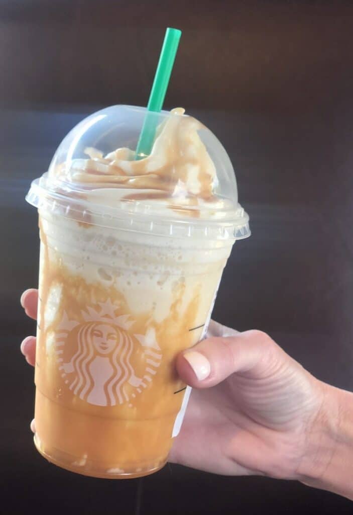 butterbeer recipes starbucks prepared in being held by a woman's hand