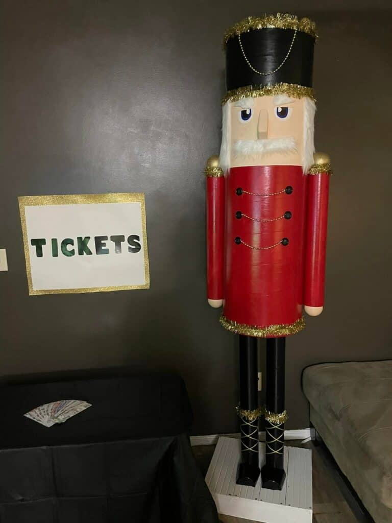 Polar Express Movie Night ticket area with a large nut cracker