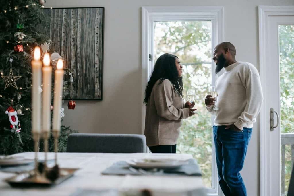 african american couple drinking wine