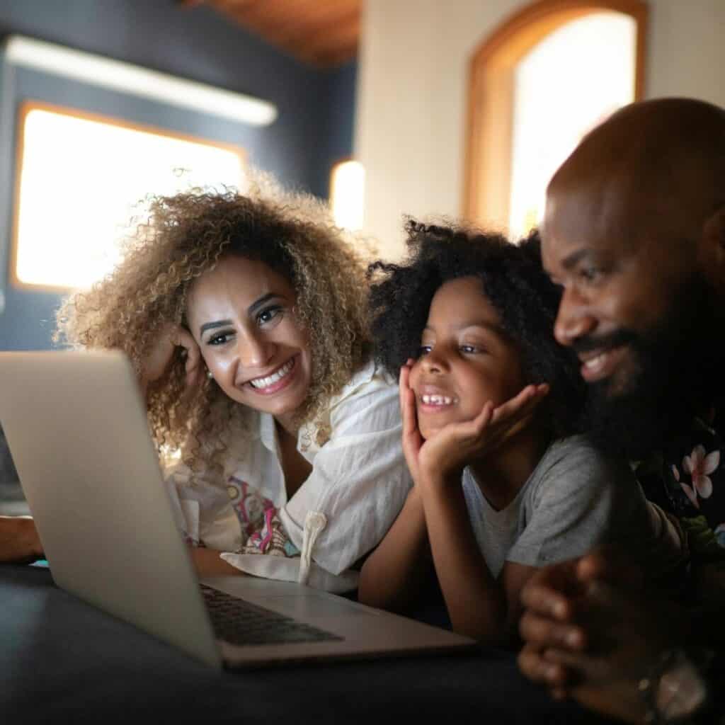 black family watching a movie