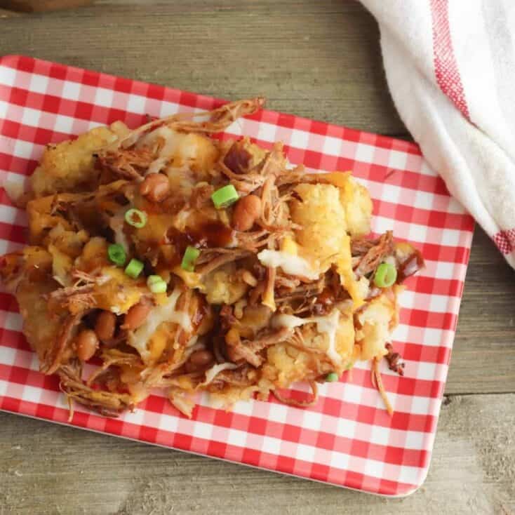 pulled pork casserole recipe on a red and white plate