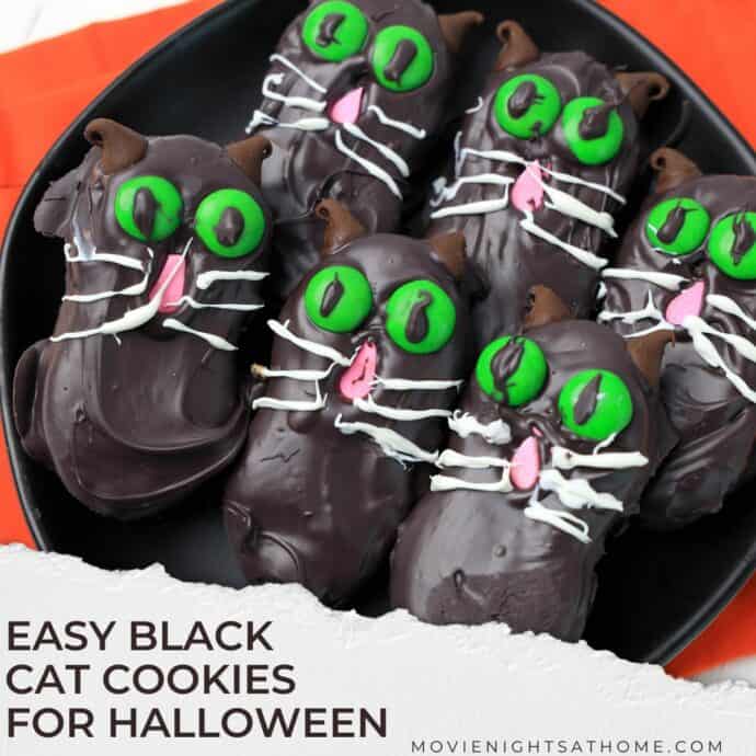 Close up of the plate of 6 cookies - text overlay says easy black cat cookies for halloween