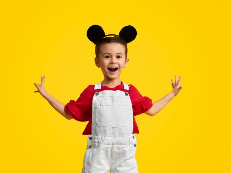 little girl with mickey mouse ears on